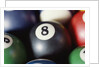 Balls on a pool table by Anonymous
