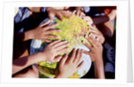 Children's Hands on Inflatable Globe by Anonymous