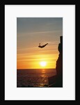 Cliff Diver Above Setting Sun by Anonymous