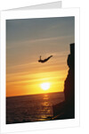 Cliff Diver Above Setting Sun by Anonymous