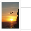Cliff Diver Above Setting Sun by Anonymous
