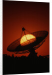 Radio Telescope Silhouetted by Setting Sun by Anonymous