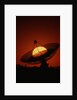Radio Telescope Silhouetted by Setting Sun by Anonymous