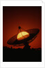 Radio Telescope Silhouetted by Setting Sun by Anonymous