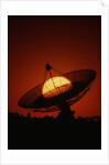 Radio Telescope Silhouetted by Setting Sun by Anonymous