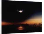 Solar Eclipse Seen from a Plane by Anonymous