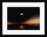 Solar Eclipse Seen from a Plane by Anonymous