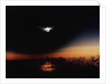 Solar Eclipse Seen from a Plane by Anonymous