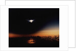 Solar Eclipse Seen from a Plane by Anonymous
