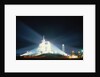 Space Shuttle Illuminated at Night by Anonymous