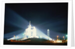 Space Shuttle Illuminated at Night by Anonymous