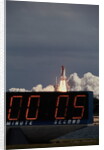 Space Shuttle Discovery Lifting Off and Countdown Clock by Anonymous