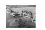 Cargo Boat Passing Under Bridge by Anonymous