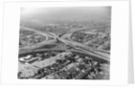 Aerial View of Highway and Suburbs by Anonymous