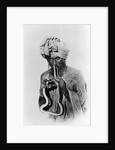 Indian Snake Charmer with Reptile up His Nose by Anonymous