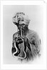 Indian Snake Charmer with Reptile up His Nose by Anonymous