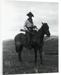 Cowboy on Horseback with Rifle by Anonymous