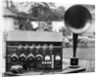 Display of an Early Radio on Residential Lawn by Anonymous