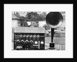 Display of an Early Radio on Residential Lawn by Anonymous