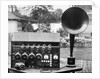Display of an Early Radio on Residential Lawn by Anonymous