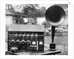 Display of an Early Radio on Residential Lawn by Anonymous