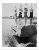 Women Holding up Their Arms in Diving Form by Anonymous