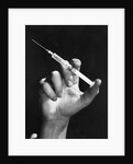 Hand Holding Syringe by Anonymous