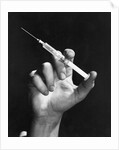 Hand Holding Syringe by Anonymous