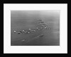 View of SBD Dive Bombers Flying Above Carrier by Anonymous