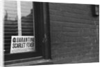 Sign Posted in Window of Building by Anonymous