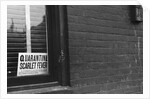 Sign Posted in Window of Building by Anonymous