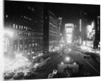 People Enjoying the Nightlife in Times Square by Anonymous