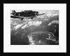 Fighter Plane Hovering Over Paific by Anonymous