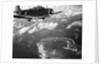 Fighter Plane Hovering Over Paific by Anonymous