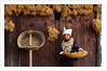 Miao Woman and Drying Produce by Anonymous