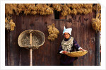 Miao Woman and Drying Produce by Anonymous