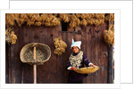 Miao Woman and Drying Produce by Anonymous