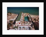 People Enjoying Pool at Beach Resort by Anonymous