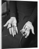 Pair of Hands Wearing Lie Detector Device by Anonymous