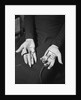 Pair of Hands Wearing Lie Detector Device by Anonymous