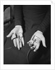 Pair of Hands Wearing Lie Detector Device by Anonymous