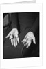 Pair of Hands Wearing Lie Detector Device by Anonymous