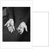Pair of Hands Wearing Lie Detector Device by Anonymous