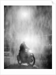 Riding a Motorcycle in Rainy Night by Anonymous