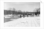 Men Gathering Ice from Frozen Pond by Anonymous