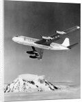 Large Aircraft Flying over Mountainous Region by Anonymous