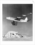 Large Aircraft Flying over Mountainous Region by Anonymous