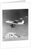 Large Aircraft Flying over Mountainous Region by Anonymous