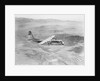Airplane Flying Over Landscape by Anonymous
