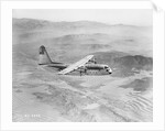 Airplane Flying Over Landscape by Anonymous